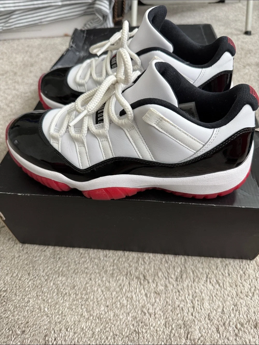 Jordan Men’s Low Top Sneakers in White, Black & Red